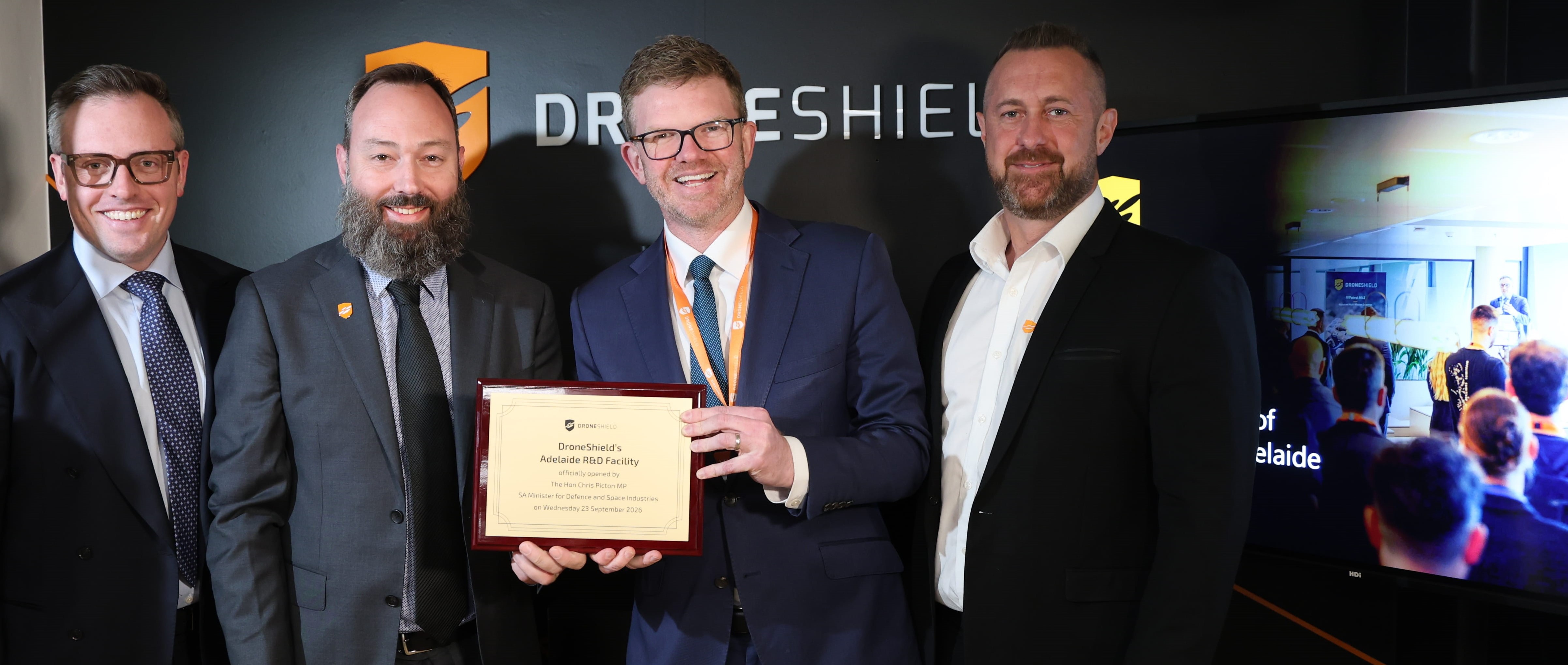 DroneShield Adelaide R&D Hub opening with (from left) DroneShield executives Angus Bean and Angus Harris, SA Defence Minister Chris Picton and DroneShield's Carl Norman. DroneShield Adelaide RD Centre Opening Angus Bean and Angus Harris DroneShield Chris Picton MP Carl Norman DroneShield 2