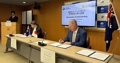 City of Moreton Bay Mayor Peter Flannery right and Mayor Takashi Namba of Shizuoka City sign the memorandum